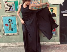 Embrace the sunshine and effortless style with this handcrafted, double-layered maxi dress in a classic black color. This versatile maxi dress offers: - Minimalist charm: simple and elegant design exudes timeless sophistication for any occasion. - Flowy comfort: premium cotton and viscose blend fabric drapes beautifully and keeps you cool on even the hottest days. - Double-layered design: adds a touch of visual interest and dimension, all while ensuring comfort and coverage. - Leg slits: enhance Viscose Dress, Layered Design, Summer Dream, Tropical Vacation, Black Maxi, Draped Fabric, Beach Walk, Summer Evening, Viscose Fabric