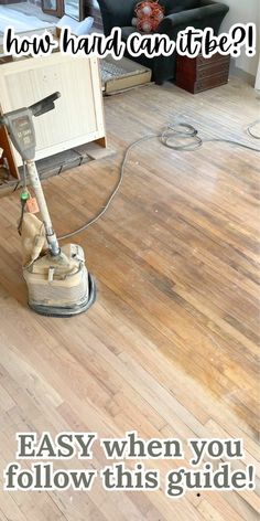 a person using a floor scruber to clean a wooden floor with the words how hard can it be? easy when you follow this guide