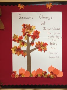 a bulletin board with an autumn tree on it