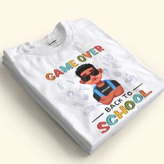 As summer ends, get them excited for the new school year with this personalized back to school tee. The soft, comfy fabric will keep them cozy whether heading to class or studying at home. This back to school-themed shirt is a great gift for any student starting a new grade. Give it to your child on the first day or your niece who just moved up to middle school. It makes a thoughtful back to school, birthday or holiday gift. Give them the gift of comfort and self-expression with this personalize Cotton T-shirt With Letter Print For School, Fun T-shirt For End Of School Year, Trendy School T-shirt With Crew Neck, White Graphic T-shirt For School, Casual Letter Print T-shirt For School Events, Fun T-shirt With Text Print For Back To School, Back To School Text Print Crew Neck T-shirt, Trendy Back To School T-shirt For School, Casual T-shirt With Text Print For Back To School