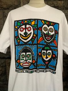 "Vintage 90s Ziggie Graphic Art Bali Island T-shirt Item Condition: Pre-Owned (Used) condition. please see pictures Size on Tag: XL, Please check measurement Tag : ------------ Measurement: ------------- Chest (Pit to Pit) 22.5\" Length 29\" Shipping: Worldwide ---------- Standard Shipping 14-30 Days Express 5-8 Days I can do combined shipping +Add USD 5 shipping for each additional items!" Cotton Graphic Tee With Artwork, Casual Cotton Tops With Artwork, Casual Cotton Top With Artwork, Graphic Cotton T-shirt With Artwork, Cotton Artwork T-shirt With Crew Neck, Casual Crew Neck Tops With Artwork, Casual Cotton T-shirt With Artwork, Cotton Crew Neck T-shirt With Artwork, Casual White T-shirt With Artwork