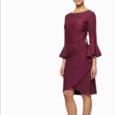 Manufacturer:Alex Evenings Suggested Price:$219.00 Manufacturer Color:Wine Condition:New With Tags Style Type:Wrap Dress Collection:Alex Evenings Material:78% Nylon/22% Spandex Country Of Origin:China Specialty:Embellished Size:18 Closure:Hidden Back Zipper Gender:Womens Fabric Type:Nylon Sleeve Length:Bell Sleeves Size Origin:Us Dress Length:Knee-Length Very Gently Used (Literally One Wedding) Dry Cleaned Perfect Condition Cannot Tell Was Ever Used. Elegant Burgundy Midi Dress For Formal Occasions, Elegant Burgundy Midi Dress, Elegant Burgundy Dress For Formal Occasions, Elegant Burgundy Formal Dress, Spring Burgundy Dresses For Weddings, Elegant Fitted Burgundy Dress, Burgundy Sheath Dress For Formal Occasions, Elegant Holiday Dresses With Ruffles, Elegant Burgundy Midi Dress For Cocktails