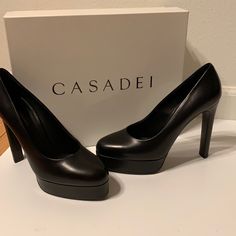 New In Box Authentic Casadei Platform Black Leather Heels Size It 38 Made In Italy * If You Are Not Familiar With This Luxury Brand Or Italian Luxury Footwear, They Run Small. I Would Suggest Someone With A Size 7 For These Beautiful Shoes. I Wear An 8 And These Are Sadly Too Small These Are Absolutely Beautiful And Classic Shoes! Msrp $875 No Lowball Offers Please Cs2 Modern Leather Court Shoes For Party, Party Heels With Leather Lining And Block Heel, Party Block Heels With Leather Lining, Sleek Party Heels With Leather Lining, Modern Leather Heels For Formal Occasions, Modern Calf Leather Court Shoes For Formal Occasions, Modern Formal Court Shoes In Calf Leather, Luxury Leather-lined Heels For Office, Luxury Leather Heels For Formal Occasions