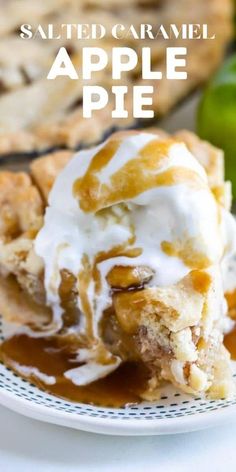 an apple pie on a white plate with caramel sauce and whipped cream over top