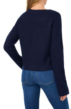 A slightly cropped length plays up the contemporary appeal of this soft and cozy V-neck cardigan. 19 1/2" length (size Medium) V-neck Long sleeves 73% acrylic, 24% polyester, 3% spandex Hand wash, dry flat Imported Crop Cardigan, V Neck Cardigan, Cropped Cardigan, Navy Blue, Hand Wash, Nordstrom, Long Sleeves, Size Medium, Spandex