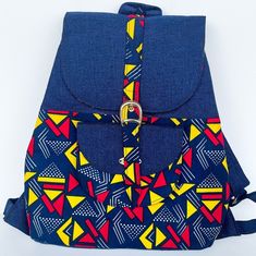 This beautiful backpack is handmade in Uganda, Africa made with super fun African fabric. It's very durable and versatile. This backpack is approximately 14'' in length and 12'' in width. All the proceeds from each item that is bought goes directly to the woman in Uganda who made that item! Great way to purchase with a purpose! Casual Handmade School Backpack, Handmade Multicolor Backpack For School, Handmade Multicolor School Backpack, Blue Cotton Standard Backpack, Blue Cotton Backpack For Travel, Multicolor Cotton Backpack For Daily Use, Uganda Africa, Beautiful Backpacks, Designer Backpack