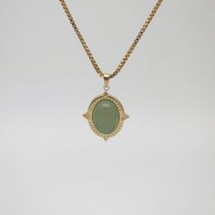 The dainty necklace features an adjustable boxing chain and a oval genuine light-green jade pendant. Add a touch of green to any outfit. Style with our Royal Jade Ring to complete your look. 18k gold plated Stainless steel base Genuine jade Pendant measures 18mm*22mm Waterproof and tarnish free 18"+2" extender Bridal Accessories Jewelry, Oval Necklace, Nameplate Necklace, Jade Necklace, Rose Necklace, Amber Necklace, Jade Ring, Rope Necklace, Jade Pendant