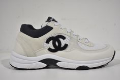 Chanel REV White Black CC Logo Leather Lace Up Flat Runner Trainer Sneaker 40 ********** Chanel ********** Brand: Chanel Size: 40 (know your Chanel size) Name: Trainer Color: White & Black Style: REV Style#: G38299 Y55720 K3846 Material: Mesh, Suede Calfskin & Grained Calfskin Lace up tie front Chanel black CC side logo White suede calfskin material White grained calfskin leather material CC tongue logo Large CC bottom logo *** SOLD OUT SUPER RARE *** Brand new in box, comes with original box and dust bag 100% Authentic or your money back Great gift I ship worldwide Any other questions just ask, I will be happy to answer them eBay store powered by Shopping Feed. Chanel Kids, Chanel Sneakers, Chanel Brand, Shoes Outfit Fashion, Fresh Shoes, Trainer Sneakers, Shopping Items, Chanel Black, Cc Logo