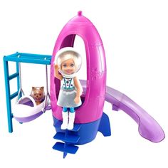 the doll is playing with her toys on the swing set in the playroom area