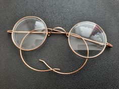 original Very good condition Vintage Gold Round Sunglasses, Gold Sunglasses With Metal Frame, Formal Sunglasses With Metal Round Frame, Vintage Gold Round Frame Sunglasses, Gold Round Frame Sunglasses With Glass Material, Gold Round Frame Sunglasses With Glass Lenses, Formal Round Frame Metal Sunglasses, Gold Round Frame Sunglasses, Gold Round Frame Glass Sunglasses