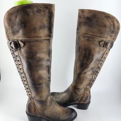 These Amazing Vince Camuto Studded Biker Boots Are In Brand New Condition. The Size Stickers Are Still On The Soles. No Box Or Tags. There Are A Few Scuffs From Storage, But Those Should Buff Out Easy. They Have An Antiqued Wear Look To Them. Size 5b/35 They Have 1 1/2" Heels, 19" Tall And Fit Calves 14" Around. Vince Camuto Studded Boots, Leather Knee-high Moto Boots With Rivets, Western Brown Boots With Rivets, Brown Wide Calf Moto Boots With Leather Sole, Leather Lace-up Boots With Rivets, Rugged Boots With Rivets And Round Toe, Fitted Rugged Moto Boots With Round Toe, Rugged Fitted Moto Boots With Round Toe, Fitted Brown Rugged Moto Boots