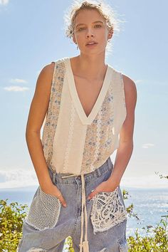 Designed in V-neck line oversized fit sleeveless knit top with rib and floral printed woven and trim. Handkerchief hem. Sleeveless Knit Top, Sleeveless Knit, Pets For Sale, Floral Knit, Cowboy Boots Women, Handkerchief Hem, Knit Tank, Hat Band, Kids Boots