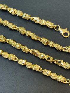 Gorgeous mens handmade nugget link chains 5.5mm thick Handmade in Italy...no two are alike   Solid 925 sterling silver finished in 14k yellow gold Gold wont fade or tarnish for years since its bonded to solid silver underneath.   Stamped 925   Great for pendants or wear alone! Don't wear the same rope or cuban chain as everyone else...get something unique!     Weighs 54-91 grams depending on length Thick chain with very good weight to it! Lays Flat and doesn't twist Very shiny and nicely made! Hip Hop Chains, Gold Nugget, Handmade Gold, Matching Bracelets, Chains For Men, Chain Link Necklace, Selling Jewelry, Gold Gold, Solid 925 Sterling Silver