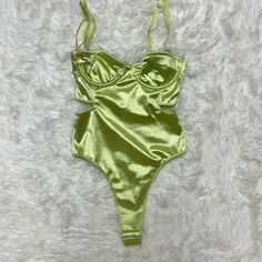 Never Worn Out Of Stock Not Too Sure Where The Stain Came From But I Haven’t Worn It. No Other Flaws Party Swimwear With Lined Body In Green, Green Sleeveless Bodysuit For Club, Green Fitted Bodysuit For Party, Chic Green Bodysuit For Party, Green Sleeveless Bodysuit For Party, Green Swimwear For Club, Spring Season, Green Club Bodysuit, Green Sleeveless Bodysuit For Night Out, Green One-piece Bodysuit For Party