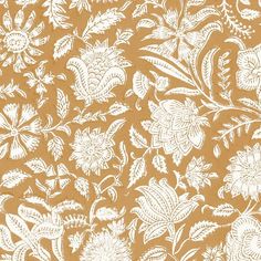 an orange and white wallpaper with flowers on it