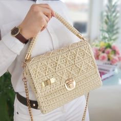 👜GENERAL FEATURES👜  FeyZolfey cream bag is produced from 100% polypropylene yarn. The overall dimensions of this women's envelope bag are 23x19x7cm. The lining inside this classy crochet purse is cotton material and has two inner pockets. This quilted bag also offers sophisticated styling. This crochet shoulder bag has one (110cm) chain shoulder strap and one crocheted handle that allows you to wear it as a handbag. It also has a snap closure system. These handmade summer bags do not contain chemicals that may affect human health. ⭐A UNIQUE PIECE⭐  FeyZolfey saddle bag for girls has a magnificent look thanks to its unique design. Crossbody bags for women , which have multiple uses, can be used daily, on the beach, at an invitation or in areas such as school. Due to the perfect size of th Classy Crochet, Small Makeup Pouch, Cream Bag, Envelope Handbag, Crochet Backpack, Cream Bags, Summer Purses, Crochet Shoulder Bag, Yarn Bag