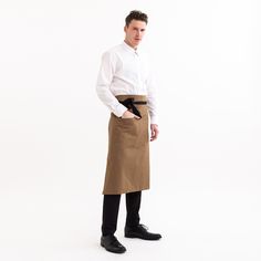 Expertly crafted in Chicago from a durable 7oz twill, this is a workhorse of a waist apron. Featuring dual hand pockets to store all of your serving needs, this apron will show up to work day in and day out. Features: Two Hand Pockets Material: 9oz 100% Cotton, Black Cotton Webbing Ties Fit: 31" Length Handmade in Chicago, USA Bistro Apron, Custom Uniform, Chicago Usa, Waist Apron, Show Up, Brown Color, Black Cotton, Herringbone, Two Hands