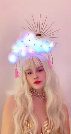 Gorgeous festival headdress, Perfect for making you feel fabulous and steal the spotlight.  This crown is called the cloud crown and has two ribbons attached to the headdband for more stability. ⭐🌟 Tassels are customisable. Please select a colour for them 🥰💕. Colour may vairy on availability. Please make sure to check your messages so I can further assist you on shades of coloured tassels. If no answer is given I will choose the shade closest to it.  If you need to get threw to me as soon as Unique Festival Headband Headpiece, Whimsical Festival Headpieces For Parties, Whimsical Headpieces For Festivals And Parties, Whimsical Festival Party Headpieces, Mystical Festival Crown Headpiece, Carnival Festival Crown Headband, Mystical Headband For Festival, Adjustable Rave Headband For Party, Mystical Headband For Festivals