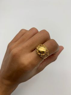 Gold Coral Ring made of Gold Vermeil: 18k Gold over Solid 925 Sterling Silver ☞ made to last.Click here for ☞ Statement Jewelry CollectionMatching Set ☞ Please ask meDetails:• Gold Anemone Ring• Band width ≈ 2.5mm, thickness ≈ 1.2mm• 18k Gold VermeilSKU TE-117 Fine Jewelry Gold Dome Ring Recycled Material, Hallmarked Gold Plated Dome Ring, Hallmarked Gold-plated Dome Ring, Fine Jewelry Dome Ring With Hallmark, Gold Domed Jewelry With Ring Detail, Fine Jewelry Hallmarked Open Dome Ring, Dainty Gold Flower Ring, Heirloom Yellow Gold Dome Ring, Tarnish Resistant, Heirloom 14k Gold Dome Ring Tarnish Resistant