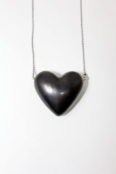 The Heart necklace features a glazed silver ceramic heart handmade by ceramists from Talavera de la Reina, Spain on a delicate stainless steel ball chain necklace. Valentine's Day Gift Ball Chain Necklace, Heart Shaped Ball Chain Necklace For Gift, Heart-shaped Ball Chain Necklace Gift, Cotton Jewelry, Gray Jewelry, Ceramic Heart, Ball Chain Necklace, Traditional Crafts, Ball Chain