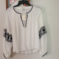 New. Go With The Flow! Split Open Neck With String Closure. Features Embroidered Touches And Voluminous Sleeves. Pit 22" ; Length21"-22". Long Balloon Embroidered Sleeves With Button Closure. Forever 21 Bohemian Top For Vacation, Bohemian Spring Blouse From Forever 21, Forever 21 White Bohemian Top, Casual Embroidered Tops From Forever 21, Lace Peplum Blouse, Pink Lace Blouse, White Boho Tops, Boho Long Sleeve Top, Bell Sleeve Shirt