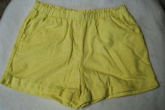 USA Standard Size: Girls XXL / 18 Brand: Wonder Nation Girls pale yellow lightweight woven shorts, soft feel, elastic waist, two front pockets, cuffed legs. Material: 65% cotton 35% rayon  One standard photo used to represent all sizes and may not match the size indicated in this listing. Pale Yellow, Casual Shorts, Elastic Waist, Wonder, Cuff, Womens Shorts, Elastic, Feelings, Yellow