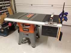 a table saw sits on top of a work bench