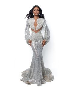 Fitted Long Sleeve Embellished Gown, Long Sleeve Dress With Detachable Train, Luxury Long Sleeve Prom Gown, Fitted Long Sleeve Gown With Detachable Train, Elegant Dresses For Glamorous Prom Events, Fitted Evening Dress For Glamorous Events, Elegant Dresses For Glamorous Events And Prom Season, Elegant Dresses For Prom Season And Glamorous Events, Elegant Dresses For Prom And Glamorous Events