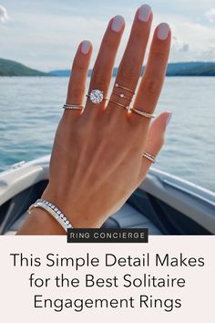 a woman's hand with three rings on it and the text, this simple detail makes