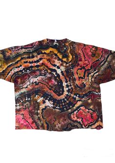 Add a splash of color to your wardrobe with this **Handmade Geode Reverse Style Tie-Dye Shirt**. Each shirt is individually handcrafted, making every piece one-of-a-kind. Perfect for festivals, casual outings, or lounging at home, this tie-dye shirt is a versatile addition to any closet. Enjoy the comfort of 100% cotton and the vibrant, long-lasting colors that won't fade. **Features - **Unique Design No two shirts are alike, giving you a truly unique piece. - **Unisex Fit Designed to fit all body types comfortably. - **Premium Quality Made from soft, breathable 100% cotton. - **Eco-Friendly Dyes Created with environmentally safe, non-toxic dyes. - **Handcrafted with Care Each shirt is lovingly crafted by hand. **Why Choose Our Tie-Dye Shirt - **Versatile Style Perfect for festivals, beach Multicolor Bohemian Relaxed Fit T-shirt, Artsy Multicolor Crew Neck Top, Relaxed Fit Short Sleeve Top With Batik Print, Relaxed Fit Short Sleeve Batik Print Top, Relaxed Fit Short Sleeve Batik Top, Relaxed Fit Batik Print Top With Short Sleeves, Multicolor Short Sleeve Tops With Batik Print, Multicolor Batik Print Short Sleeve Top, Artsy Multicolor Short Sleeve Tops