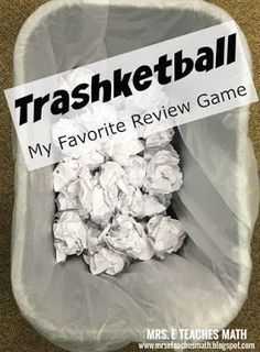 a bag full of trash sitting on top of a carpeted floor next to a sign that reads trashket ball my favorite review game