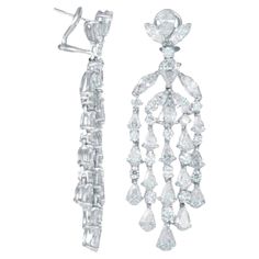 Diamond Chandelier Earrings in Platinum Platinum earrings with 18.05 carats of fancy cut diamonds Diamond specifications: Nearly colorless, VS/SI clarity This product comes with a certificate of appraisal This product will be packaged in a custom box Composition Platinum 18.05 ct diamonds Ref: DEA1676 Formal Diamond Drop Chandelier Earrings, Luxury Drop Chandelier Earrings For Formal Occasions, Luxury Formal Chandelier Earrings With Prong Setting, Luxury Diamond Chandelier Earrings, Formal Diamond Cut Chandelier Earrings, Formal White Brilliant Cut Chandelier Earrings, Luxury Chandelier Earrings With Brilliant Cut Cubic Zirconia, Luxury Pear-shaped Chandelier Earrings For Formal Events, Luxury Diamond Chandelier Earrings With Brilliant Cut