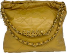 Gold Quilted Bag For Everyday Luxury, Luxury Gold Quilted Bag, Luxury Quilted Gold Bag, Designer Quilted Gold Bags, Gold Quilted Top Handle Bag, Chanel 22 Bag, Chanel 22, Quilted Leather, Chanel