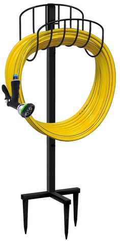 a yellow hose is attached to a black stand