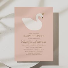 a baby shower card with a swan on it