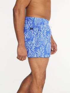 Grab your sunglasses and your flamingo floaty and sink into island time with these faded swimmers. These jealousy-inducing trunks feature an ultra quick drying shell, mesh basket liner and a zipper back pocket. Not to mention the elastic waistband and build-in drawstring designed to keep your trunks secure from the swim up bar all the way to the all you can eat crab leg buffet. Fabric: 52% Cotton/41% Polyester/7% Spandex Machine Wash Cold, Tumble Dry Low Best for: Swimming, Sunbathing, Boat Days Fitted Tropical Swim Trunks For Pool, Fitted Swim Trunks For Vacation Pool, Blue Hawaiian Swim Trunks For Pool, Tropical Blue Swimwear For Water Sports, Relaxed Fit Swim Trunks For Vacation Poolside, Blue Tropical Swim Trunks For Pool, Blue 4-way Stretch Swimwear For Poolside, Blue Hawaiian Swim Trunks For Vacation, Tropical Swimwear With Relaxed Fit For Poolside