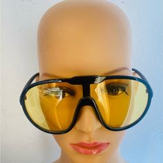 Lens Material Polycarbonate Frame Material: Polycarbonate Retro Yellow Plastic Sunglasses, Yellow Retro Plastic Sunglasses, Modern Yellow Shield Sunglasses With Anti-reflective Coating, Yellow Shield Sunglasses With Uv Protection For Summer, Modern Yellow Anti-reflective Shield Sunglasses, Retro Yellow Sunglasses With Uv Protection, Yellow Tinted Plastic Sunglasses, Yellow Plastic Sunglasses For Party, Yellow Plastic Party Sunglasses