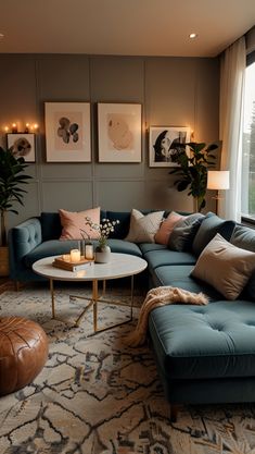 a living room filled with lots of furniture next to a large window on top of a rug