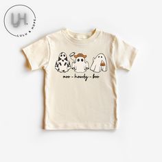 Retro Ghost Moo Howdy Boo - Halloween Shirt - Baby Toddler & Kids Size Get ready to make this Halloween unforgettable for your little ones with our exclusive Retro Trio Ghost Halloween Shirts! Designed to add a dash of spooky nostalgia to their festive attire, these shirts are available in toddler and youth sizes, ensuring a perfect fit for every age. Crafted with care and sustainability in mind, these shirts come in three charming tee color options: Deep Heather Grey, Natural, and White. 👻 Ret Playful Cartoon Print T-shirt For Fall, Playful Pre-shrunk Tops For Halloween, Playful Cotton Tops For Halloween, Playful Halloween T-shirt With Cartoon Print, Halloween Playful Short Sleeve T-shirt, Cute Halloween Tops With Character Print, Playful Short Sleeve T-shirt For Halloween, Spooky Cotton Shirt With Character Print, Playful Fall T-shirt With Cartoon Print