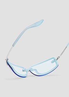 A sleek rectangular silhouette with lenses overlayed on the wrapped frames. Frames are made with combination of durable, lightweight plastic that outlines the silhouette and striking metal details on the nose bridge and temples. Comfortable acetate eartips provide a secure fit. Metal frames with blue flash lenses. Modern Blue Acetate Sunglasses, Blue Gradient Lens Sunglasses In Acetate, Blue Acetate Sunglasses With Gradient Lenses, Modern Blue Polycarbonate Sunglasses, Blue Rimless Glass Sunglasses, Bonnie Clyde, Metal Frame, Sale Items, Sleek