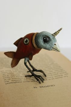 a book with a bird on top of it