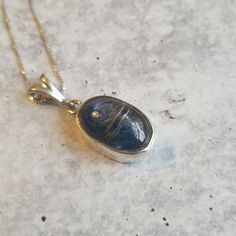 A Kyanite Pendant Handmade Using Sterling Silver And Pending From A Sterling Silver Adjustable Chain. Kyanite Necklace, Silver Kyanite Jewelry For Gift, Handmade Sapphire Kyanite Necklace, Sapphire Kyanite Jewelry For Gift, Gold Chain Link Necklace, Luxury Blue Kyanite Jewelry, Cat Pendant Necklace, Rhinestone Crown, Necklace Brands