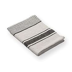 a black and white striped towel on a white background