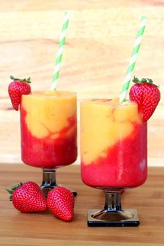 two glasses with strawberries and peach wine slushies