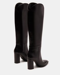 A pointed toe and curved topline give the BIXBY block heel knee boot a Western edge while the sleek upper highlights the clean monochrome look Point toe block heel knee boot Slip-on style Curved topline 3.5 inch heel height Size 6 measurements: 15.5 inch shaft circumference, 14.25 inch shaft height Size 8 measurements: 16 inch shaft circumference, 15 inch shaft height Size 10 measurements: 17 inch shaft circumference, 15.5 inch shaft height Leather upper material Synthetic and textile lining Syn Black Boots Outfit Women, Black Women Fall Fashion, Black Tall Boots Outfit, Black Leather Boots Outfit, Black Leather Heel Boots, Flat Black Boots, Womens Black Boots, Black Cowgirl Boots, Tall Heeled Boots