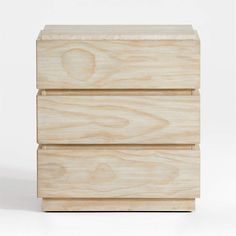 two wooden drawers sitting side by side on top of each other in front of a white background