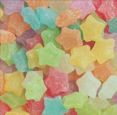 the gummy bears are colorful and have stars on them