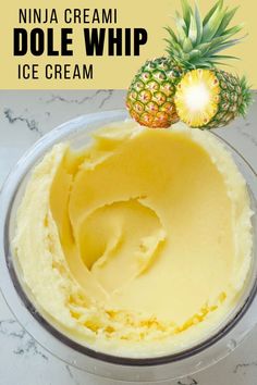 a bowl filled with ice cream next to a pineapple on the side and text overlay that reads, ninja cream dole whip