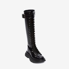 Description:Bound to be an androgynous addition to your shoe portfolio. this pair of black boots will toughen up your ensemble with military finishing touch. With the polished look of high-end patent leather. they have a classic rounded toe upper set on durable rubber soles fully constructed with grippy tread for a practical reason. Punctuated with silver toned eyelet hardware that lines the shaft. they come with a full inside zip fastening along the almost knee length silhouette with a wide strap and metal buckle for double security. The sleek shoes are ready to take you out and ensure a confident strutting whenever you're heading. EU US CM 35 4 22.1 36 5 22.8 37 6 23.5 38 7 24.2 39 8 24.8 40 9 25.5 41 10 26.2 42 11 26.8 43 12 27.5 Punk Style Knee-high Leather Lace-up Boots, Punk Style Leather Knee-high Lace-up Boots, Leather Gothic Knee-high Combat Boots, Gothic Black Knee-high Boots For Fall, Black Knee-high Edgy Martin Boots, Edgy Black Knee-high Lace-up Boots, Alternative Black Knee-high Boots For Fall, Edgy Black Knee-high Martin Boots, Alternative Style Black Knee-high Boots For Fall