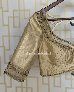 APR Vastrakala | The Gold Tissue with hand embroidered border, intricately woven with Zari and Zardosi,extends to a graceful pallu, creating a visual... | Instagram Blouse Neck Models, Pattu Saree Blouse Designs, Simple Blouse Designs, Embroidered Velvet, Elegant Blouse Designs